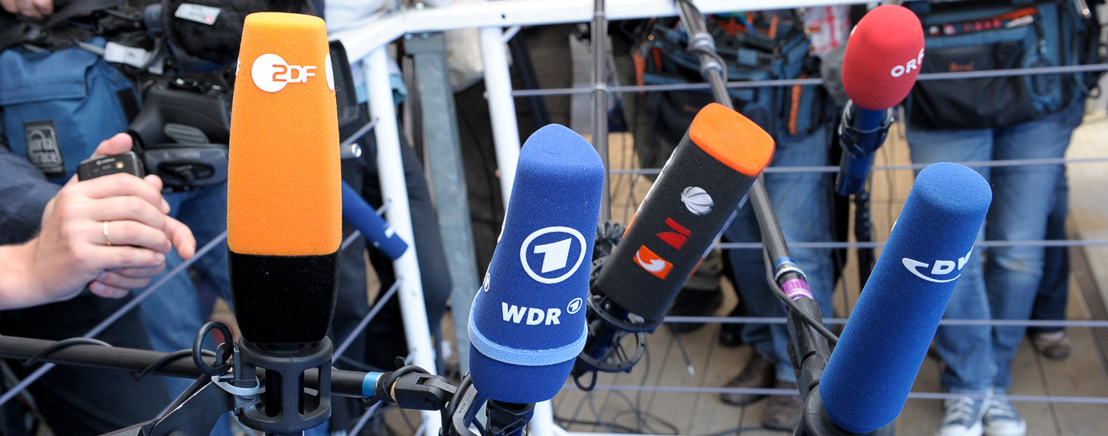 Reporters microphones